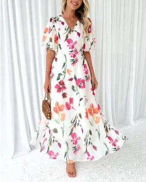 Elegant dress with puff sleeves and floral print