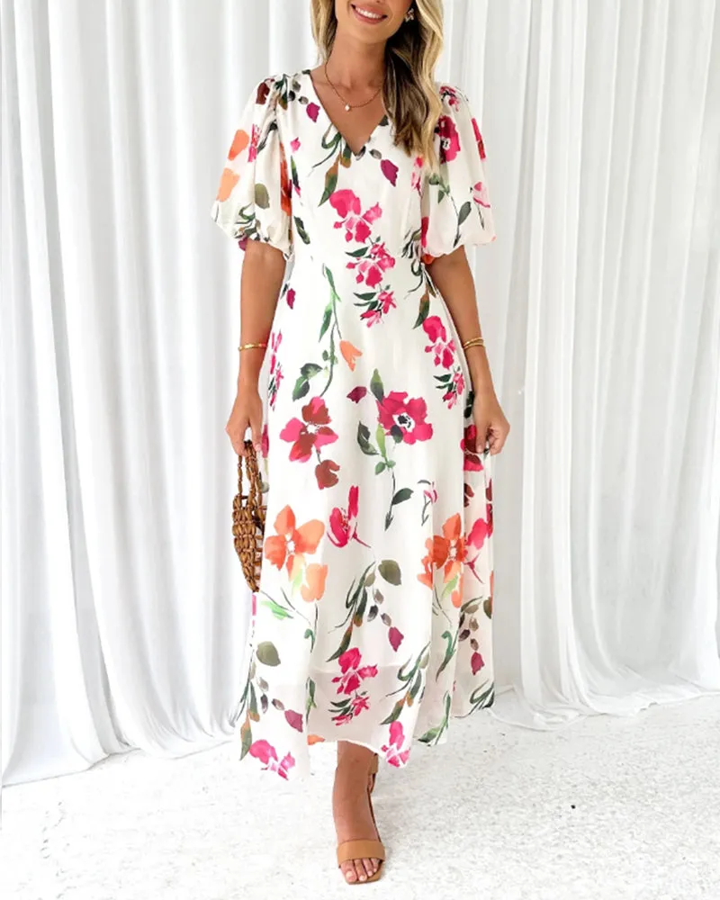 Elegant dress with puff sleeves and floral print